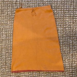 Urchin sherbet orange skirt, raspberry crochet hem